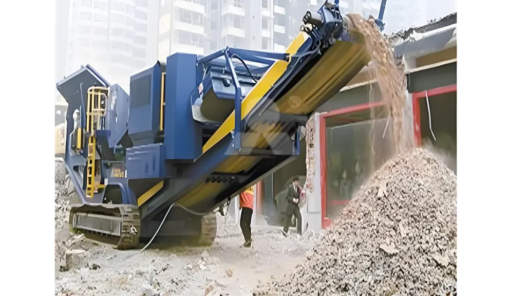 Air classification module mounted on a mobile vibrating screen, actively blowing lightweight wood and plastic contaminants out of the heavy recycled concrete aggregate flow