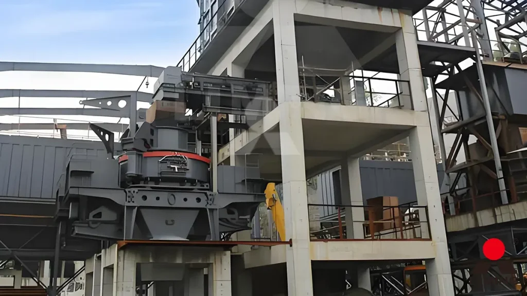 Perfectly cubical 0-5mm manufactured sand exiting a VSI6X sand maker, demonstrating the geometric cure of flaky river pebbles via kinetic rock-on-rock collision.